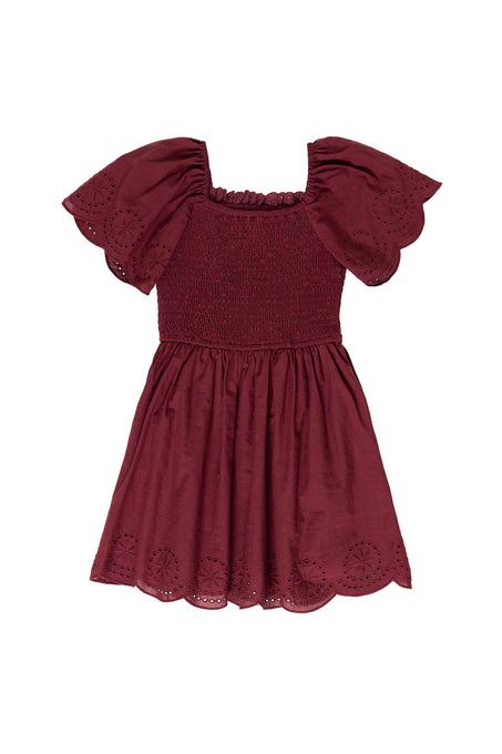 burgundy dress against a white background 