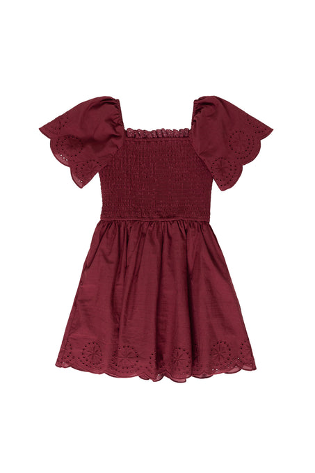 burgundy dress against a white background 