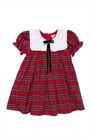 Red plaid dress with white collar and black bow on a white background