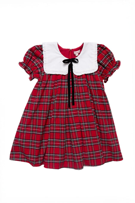 Red plaid dress with white collar and black bow on a white background