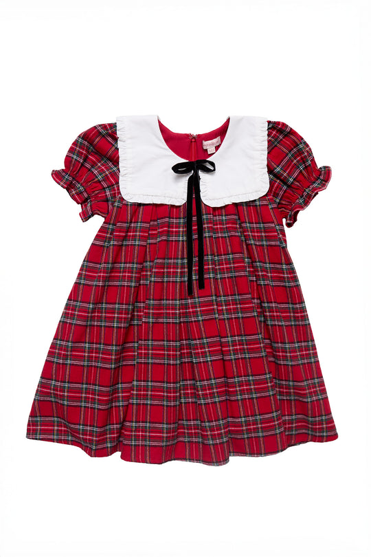Red plaid dress with white collar and black bow on a white background
