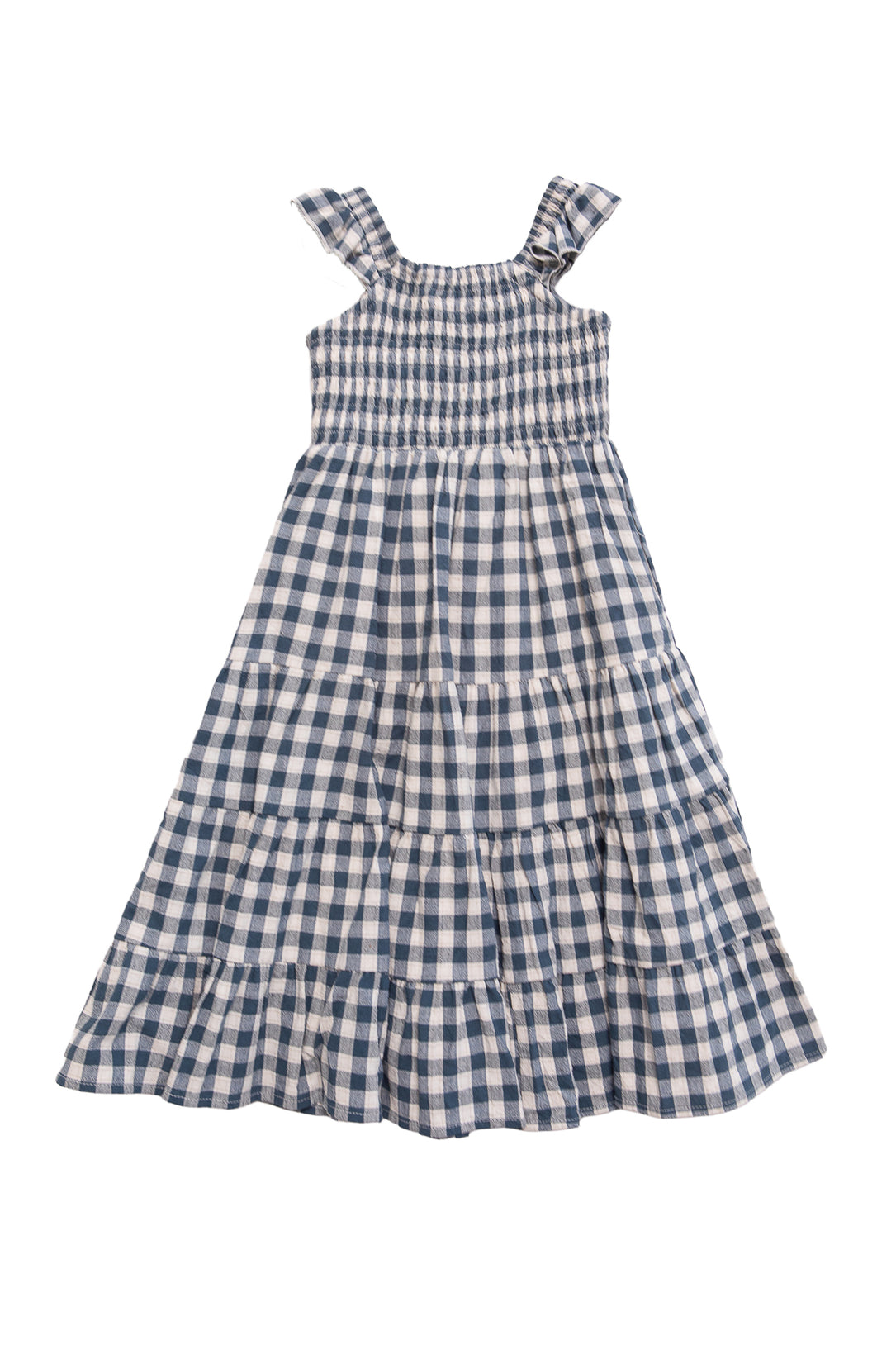 The Mini Hailey Dress in Indigo Gingham by Ivy City Co is a sleeveless cotton girls midi dress with blue and white checks, ruffled shoulder straps, smocked bodice, and a tiered ankle-length skirt for all-day comfort.