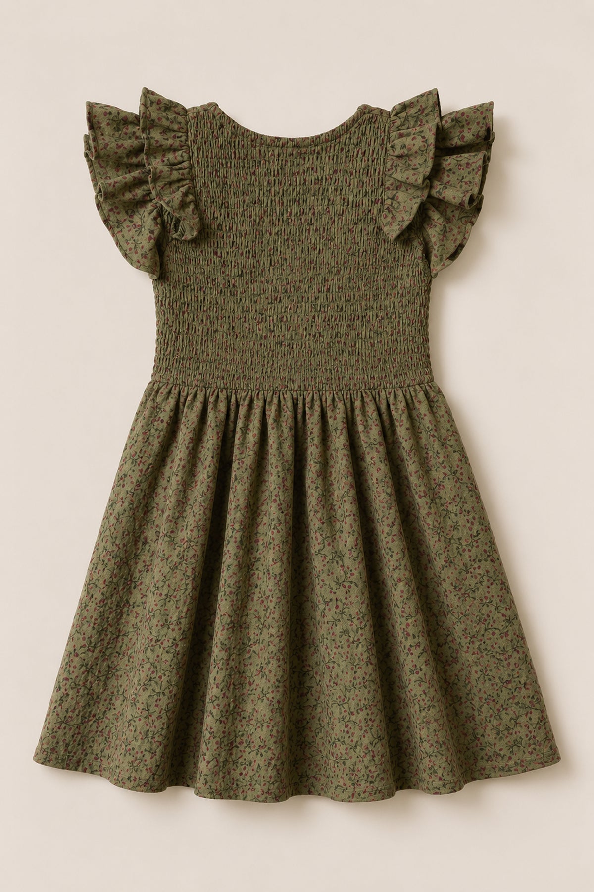 The Mini Hattie Dress in Woodland Floral by Ivy City Co features a smocked bodice, ruffled short sleeves, and a flared skirt, crafted from soft cotton and displayed on a light beige background.