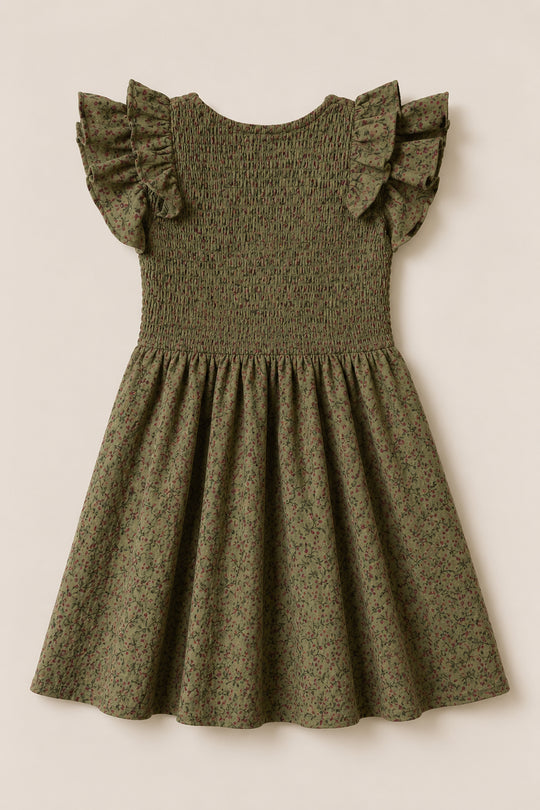 The Mini Hattie Dress in Woodland Floral by Ivy City Co features a smocked bodice, ruffled short sleeves, and a flared skirt, crafted from soft cotton and displayed on a light beige background.