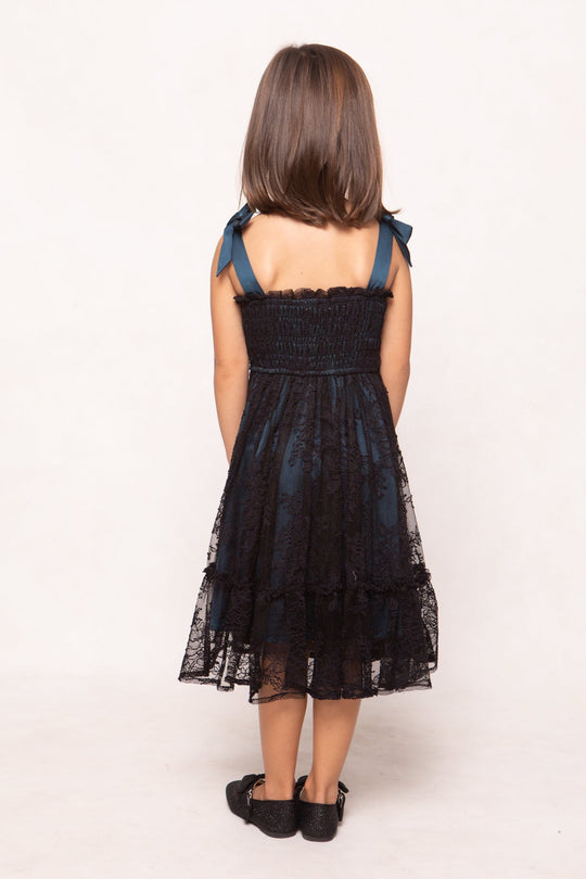 blue dress and black shoes Girls Isadora Lace in Navy & 11/12 complete_the_look_review_us How to Wash and Color:Yellow it features a smocked