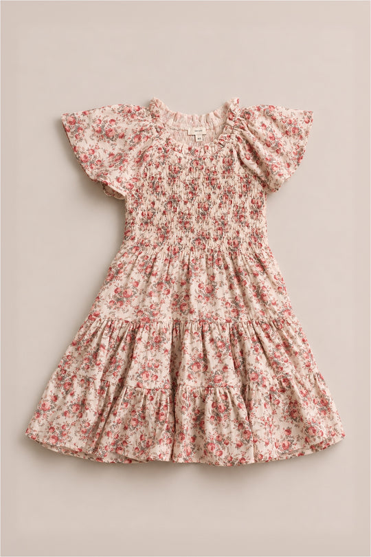 The Mini Jovie Dress in Ivory Heritage Rose by Ivy City Co is a girls' cotton midi dress with a smocked bodice, pink floral print, ruffled sleeves, and a tiered skirt—ideal for Mom and Me matching dress moments.
