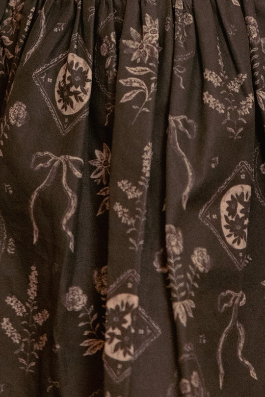 close up fabric shot of a green dress