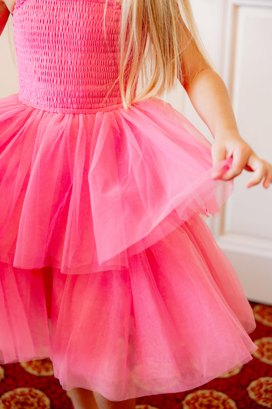 little girl in a pink tulle dress