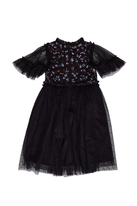 Black dress with floral detail against a white background