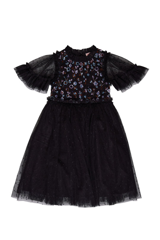 Black dress with floral detail against a white background
