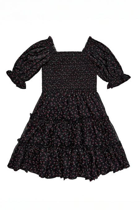 Black floral dress with puff sleeves on a white background