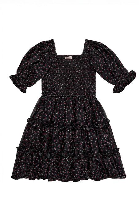 Black floral dress with puffed sleeves on a white background