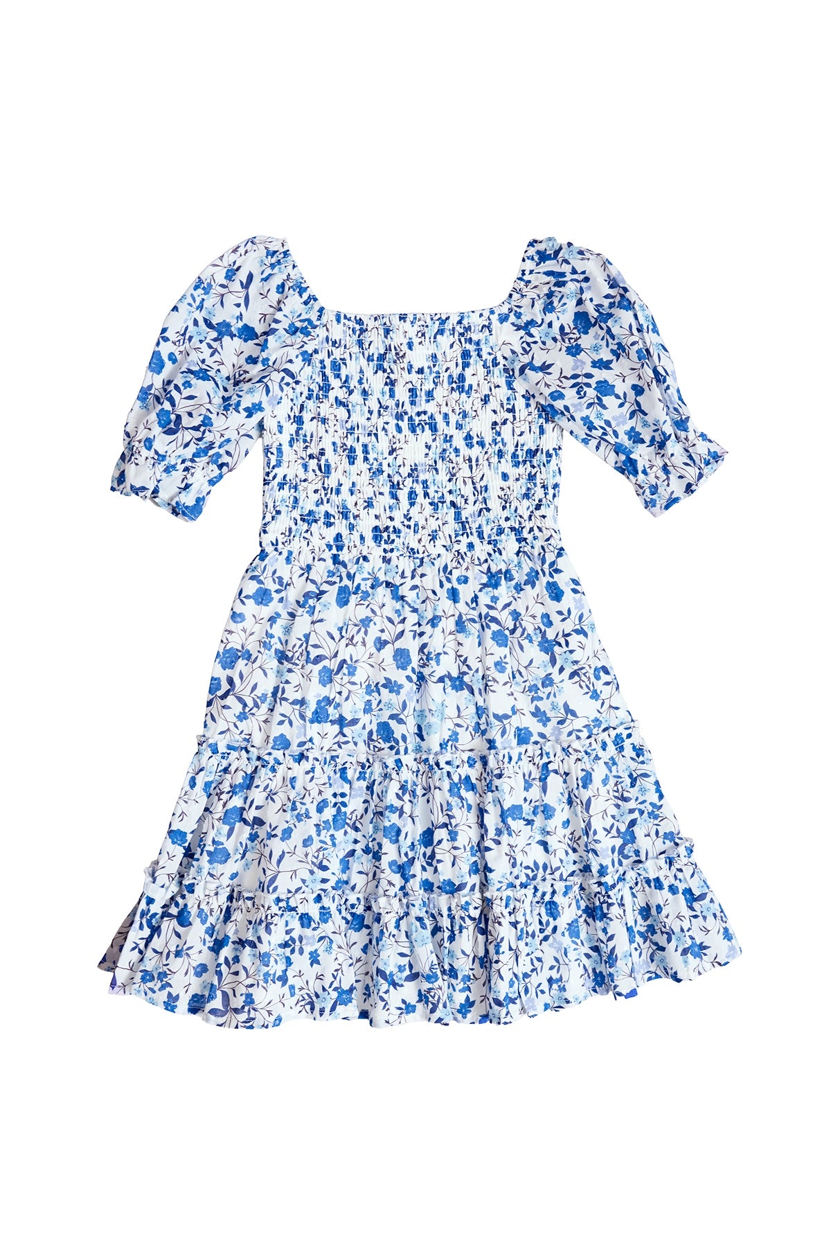 The Mini Madeline Dress in Ditsy Cobalt Floral by Ivy City Co features blue and white ditsy florals, short puff sleeves, square neckline, smocked bodice, and a tiered ruffled skirt—ideal for Mom and Me matching outfits. Shown on a white background.