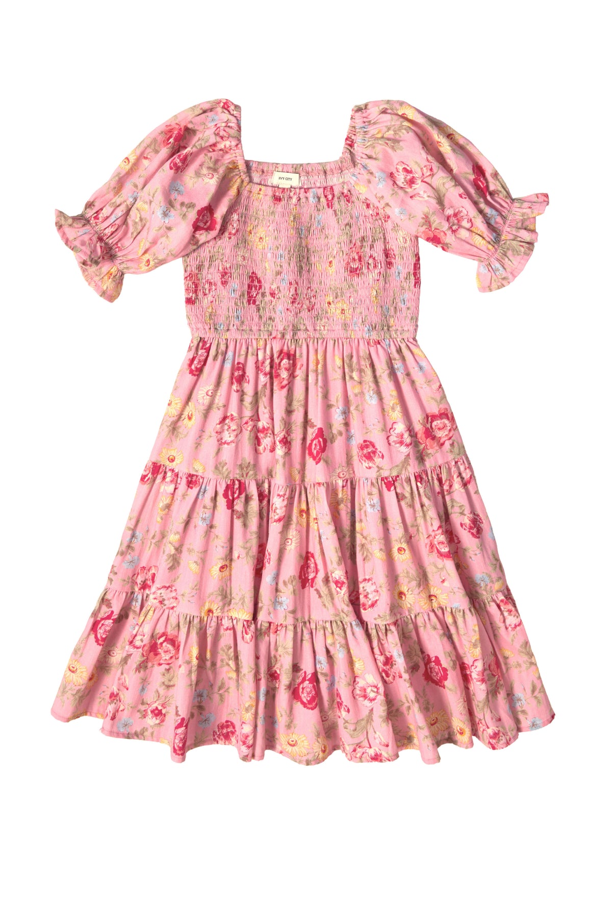The Mini Madeline Dress in Pink Vintage Poppies by Ivy City Co features puffed short sleeves, a smocked bodice, tiered ruffled skirt, square neckline, and an all-over colorful floral print—perfect for spring.