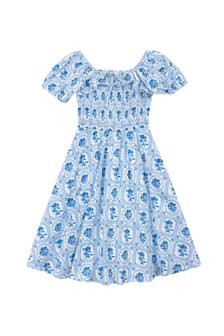 The Mini Mae Dress in Blue Floral Stamp by Ivy City Co is a short-sleeved, knee-length dress with a geometric floral pattern, smocked bodice, and flared skirt—ideal for an effortless summer look.