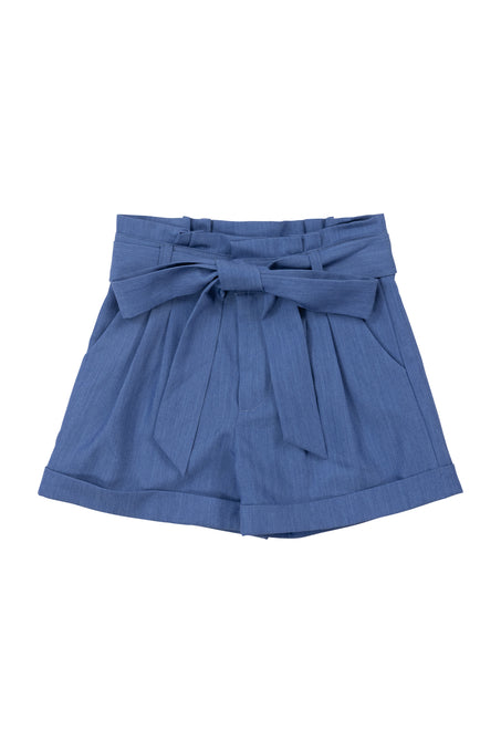 Ivy City Cos Mini Maria Shorts in Chambray feature a high waist, wide waistband, front pleats, matching belt, cuffed hem, and relaxed fit—perfect girls shorts for an easygoing summer look.