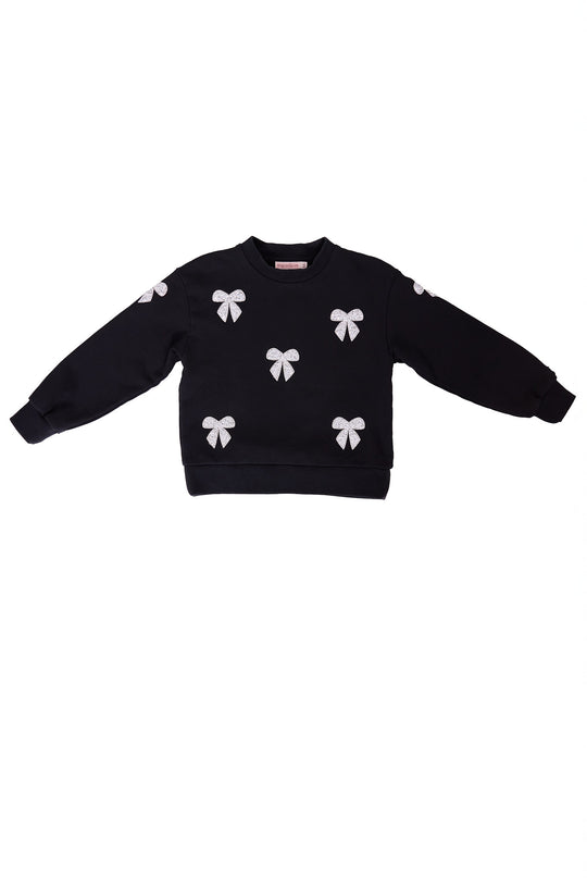 black sweatshirt with rhinestone bow detail against a white background