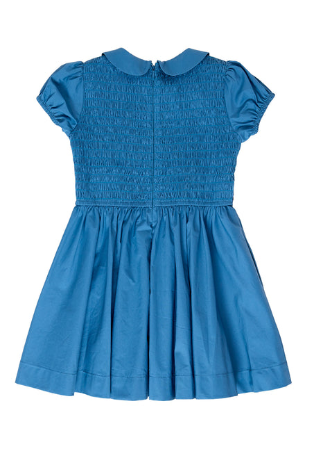 Blue dress with ruffled sleeves and collar on a white background