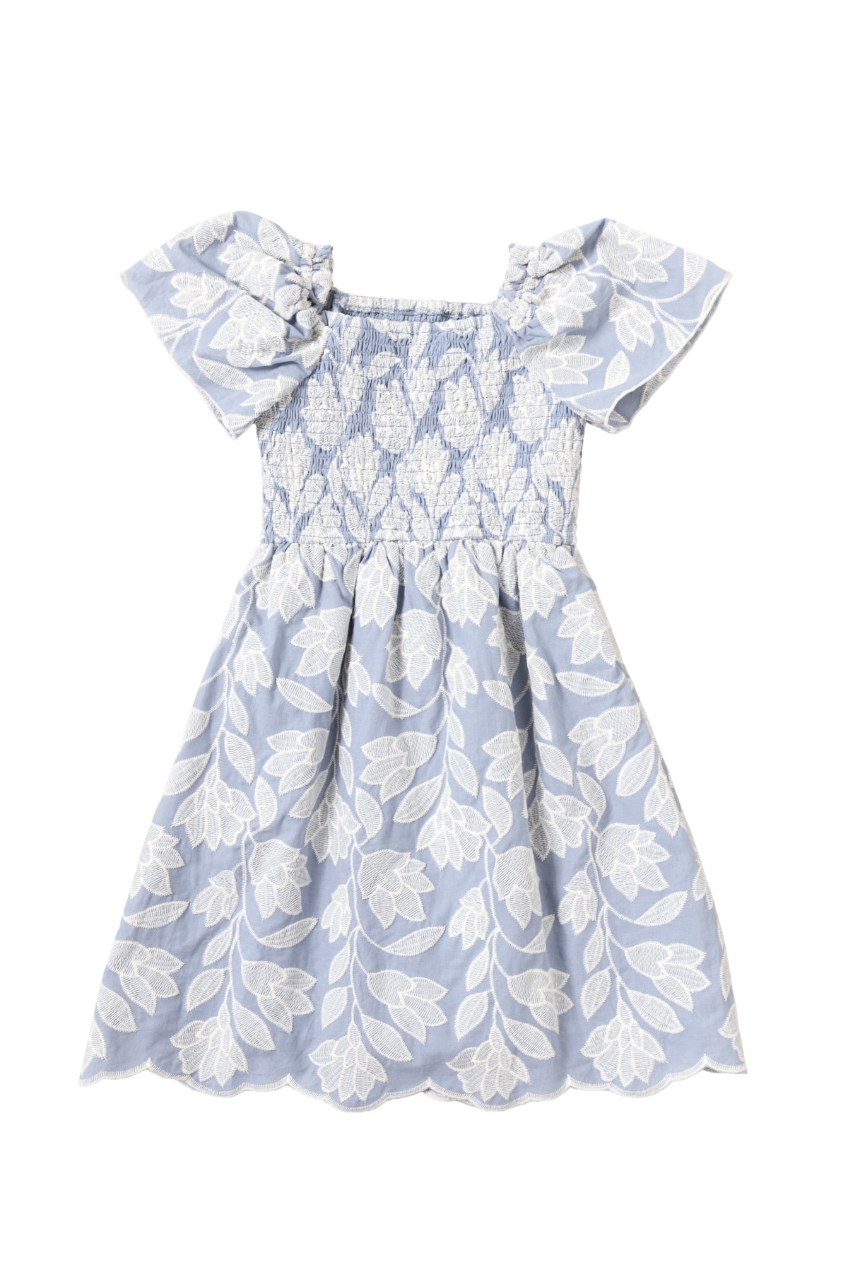 The Mini Ophelia Dress in Mosaic Embroidery by Ivy City Co features light blue fabric, white floral embroidery, a smocked bodice, ruffled sleeves, and a flared skirt—ideal for adorable Mom and Me matching moments.