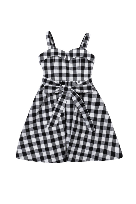 The Ivy City Co Mini Patty Dress in Black Gingham features a sleeveless design, sweetheart neckline, fitted bodice, spaghetti straps, and a bow-tied waist belt, shown laid flat on a white background.