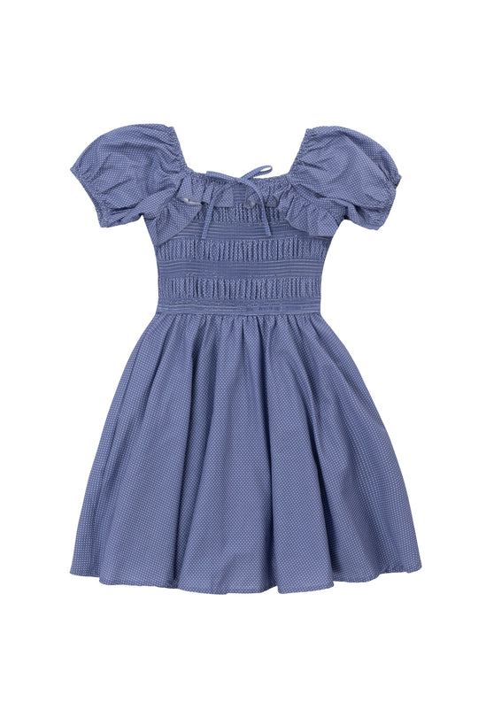 The Mini Rae Dress in Blue Polka Dot by Ivy City Co is a cotton mini dress with short sleeves, off-the-shoulder design, smocked bodice, flared skirt, subtle dotted pattern, and a center neckline bow.