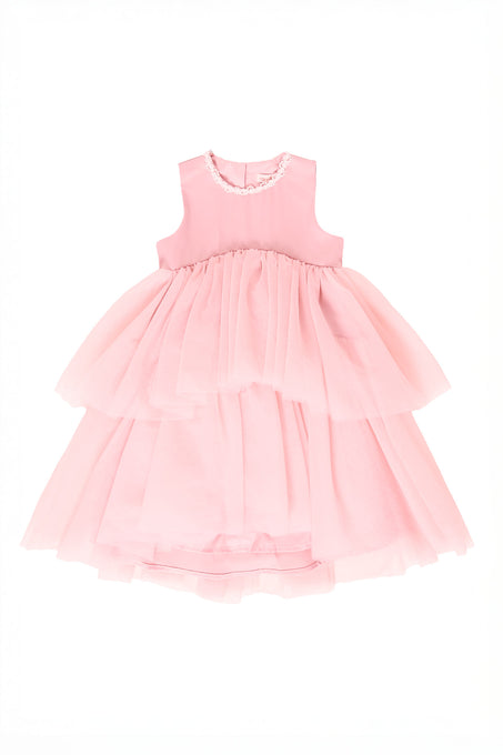 Pink tiered dress on a white background