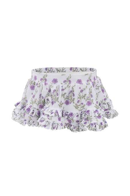 The Mini Rita Ruffle Skirt in Maeve Floral by Ivy City Co features white tiered ruffles, a purple floral pattern, and an elastic waistband, shown against a plain white background.