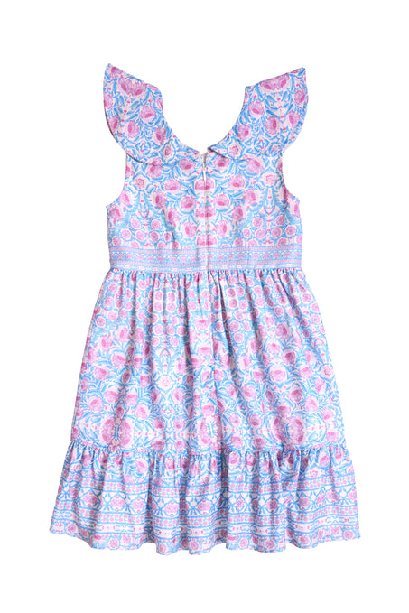 The Mini Samara Dress in Thistle Flower Mosaic Florise by Ivy City Co is a sleeveless girls’ dress with ruffled shoulders and hem, blue and pink floral print, fitted bodice, and gathered skirt—ideal for Mom and Me matching. Displayed flat on white background.