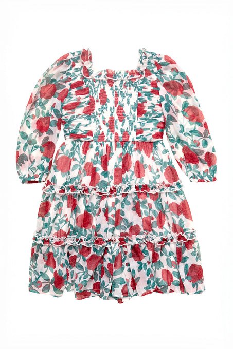 Floral dress with red and green pattern on a white background
