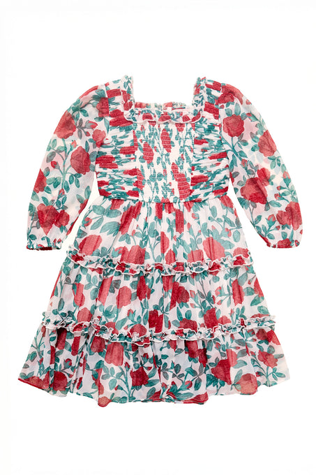 Floral dress with red and green pattern on a white background