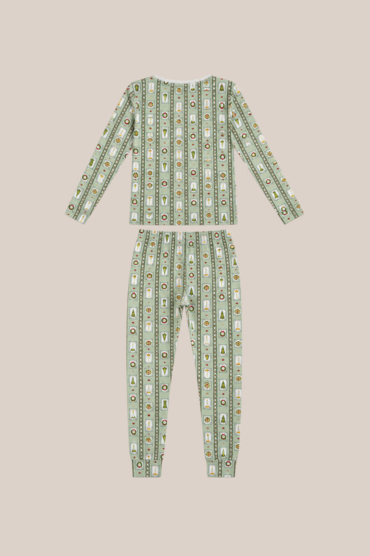 The Mini So Soft Henley Pajama Set in Merry Mail Linear by Ivy City Co features long sleeves and pants with a festive striped print of cartoon animals, trees, and icons on light green, styled flat on a beige surface.