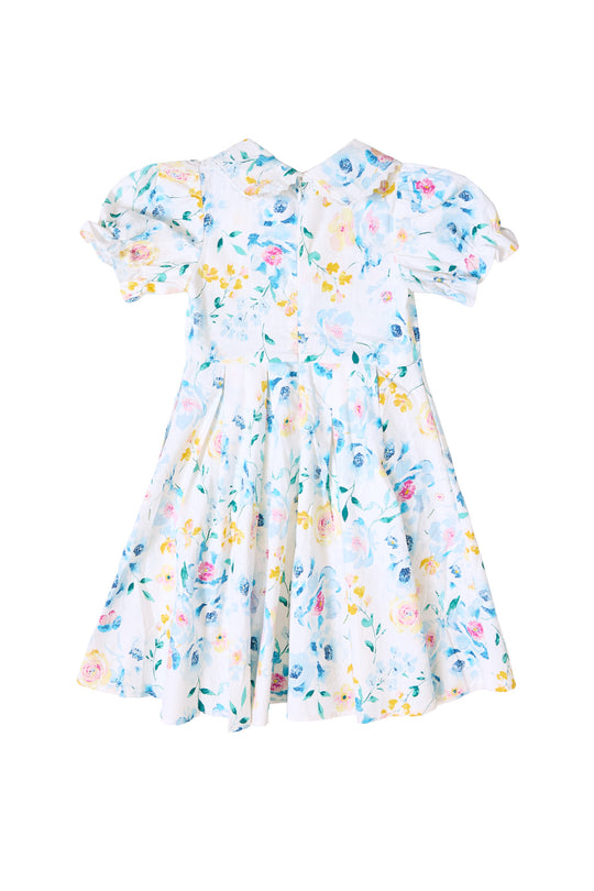 The back of a blue floral dress against a white background