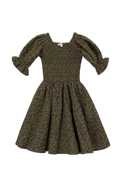 The Mini Teagan Dress in Woodland Floral by Ivy City Co features a smocked bodice, puff sleeves, and a flared skirt with a subtle dark floral pattern for an effortlessly charming olive green look.