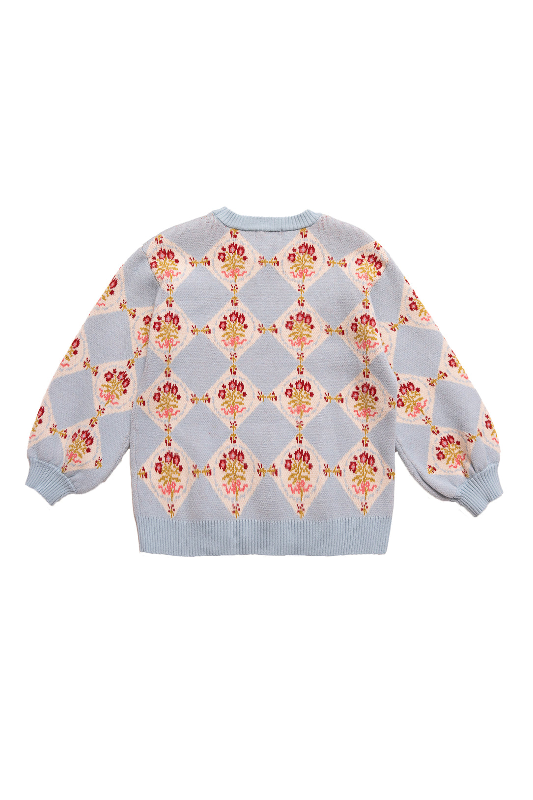 The Mini Vivienne Sweater in Mosaic Bloom by Ivy City Co features a baby blue base with diamond patterns and clusters of red, yellow, and pink flowers. This girls’ sweater has long sleeves plus ribbed cuffs and hem for a charming floral look.