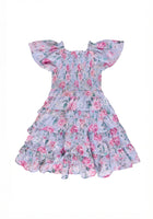 purple floral dress against a white backdrop
