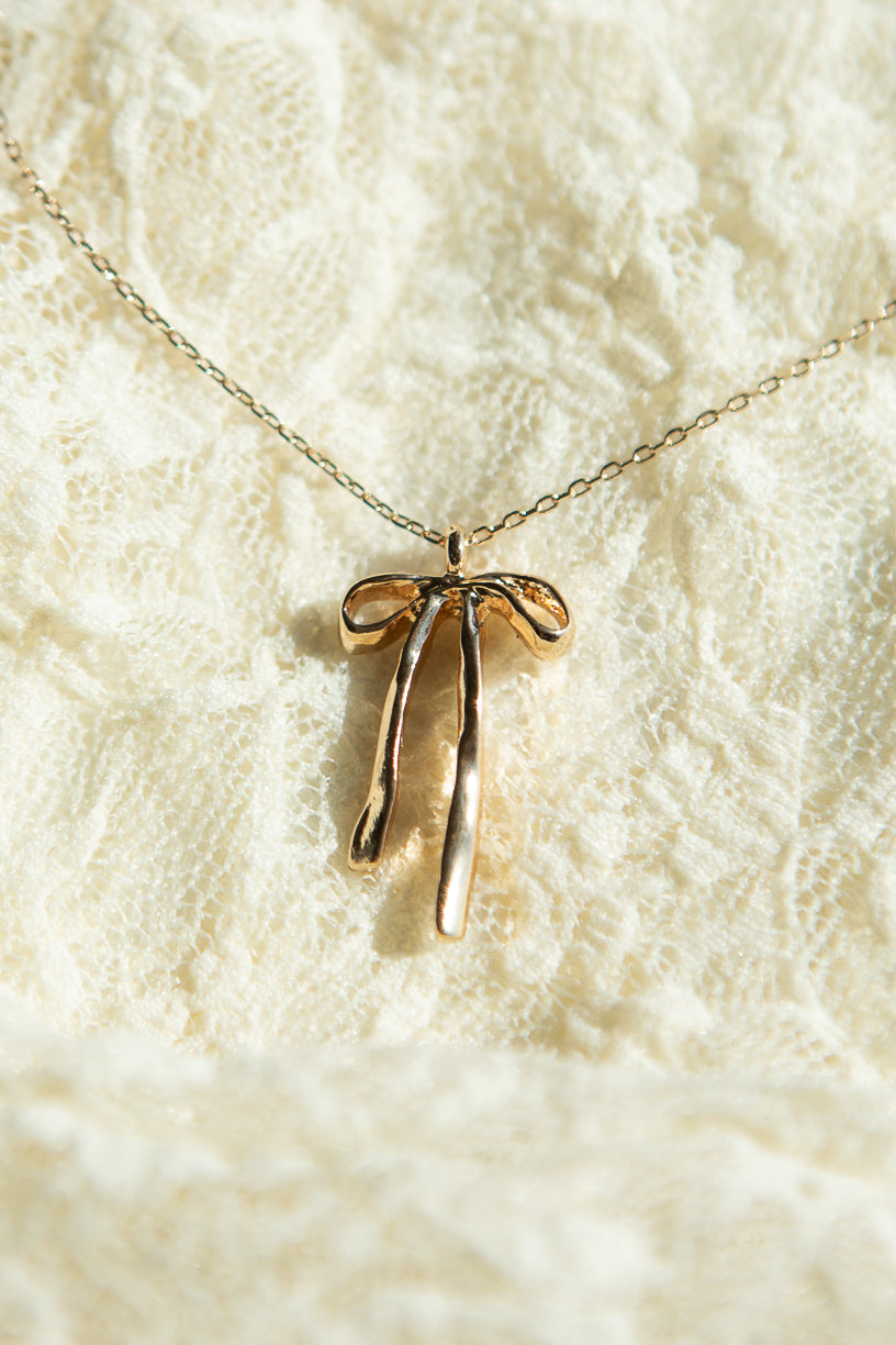 Gold Molten Bow Necklace