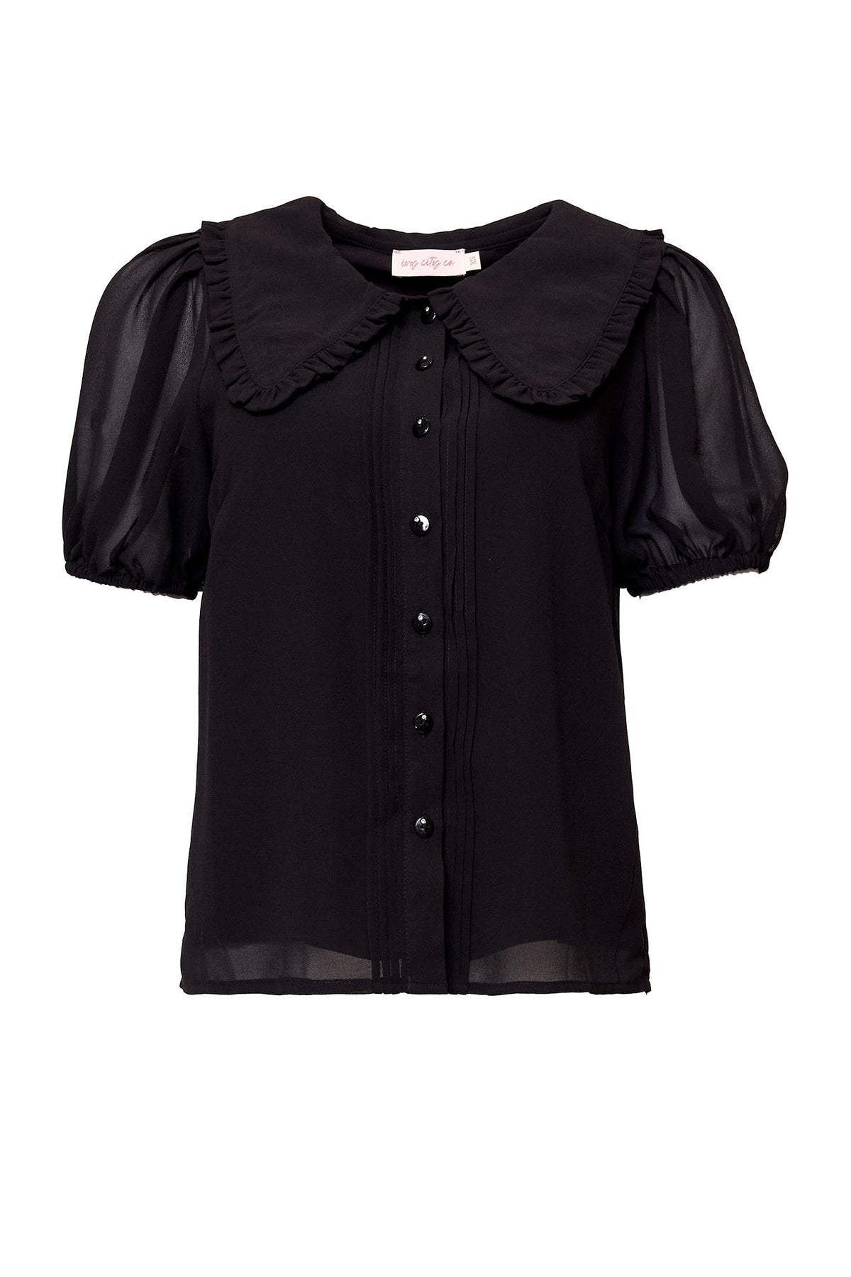 The Andrea Blouse in Black Chiffon by Ivy City Co features short puff sleeves, a wide ruffled collar with scalloped edges, and front buttons. Crafted from a lightweight, slightly sheer chiffon fabric.