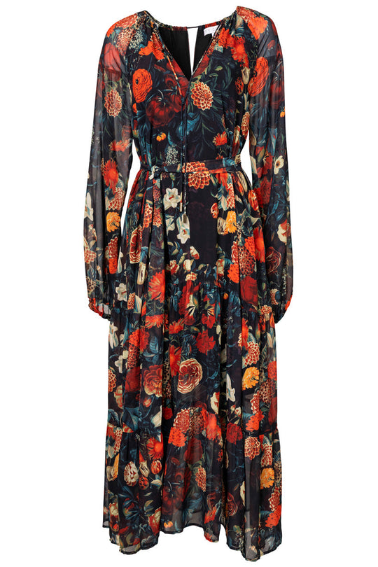 The Ivy City Co Imogen Dress in Moody Floral is a maternity-friendly, long-sleeved, ankle-length dress featuring a fitted waist and flowing skirt. It showcases a vibrant red, orange, and green floral pattern set against a dark background for an elegant look.