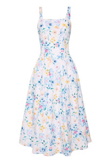 White floral dress against a white backdrop