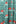 Textile with red floral pattern on a green background