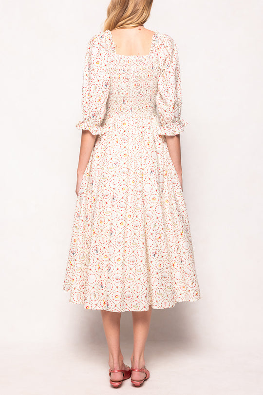 Woman wearing a floral dress on a white background