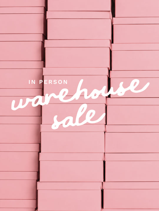 Stacks of pink boxes with white text reading “July 17-18 | Utah Warehouse Sale” by Ivy City Co, highlighting a ticketed admission event in Riverton, Utah.