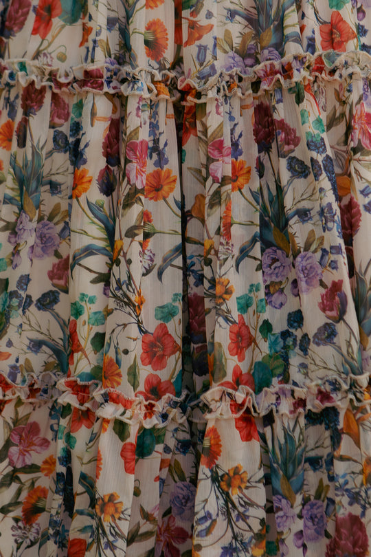 Close-up of the Selena Dress in Vivid Meadow by Ivy City Co, showing ruffled fabric with a vivid floral print—ideal for a tiered skirt or flowing midi dress with gathered layers.
