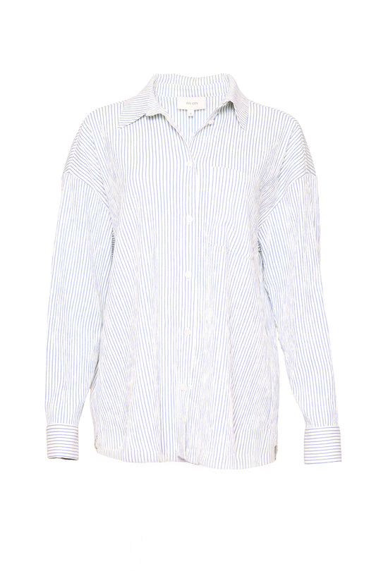 The Ivy City Co Sevilla Top in Blue & White Pinstripe is a button-up shirt featuring long sleeves, a collar, and a smocked bodice, shown against a plain white background.