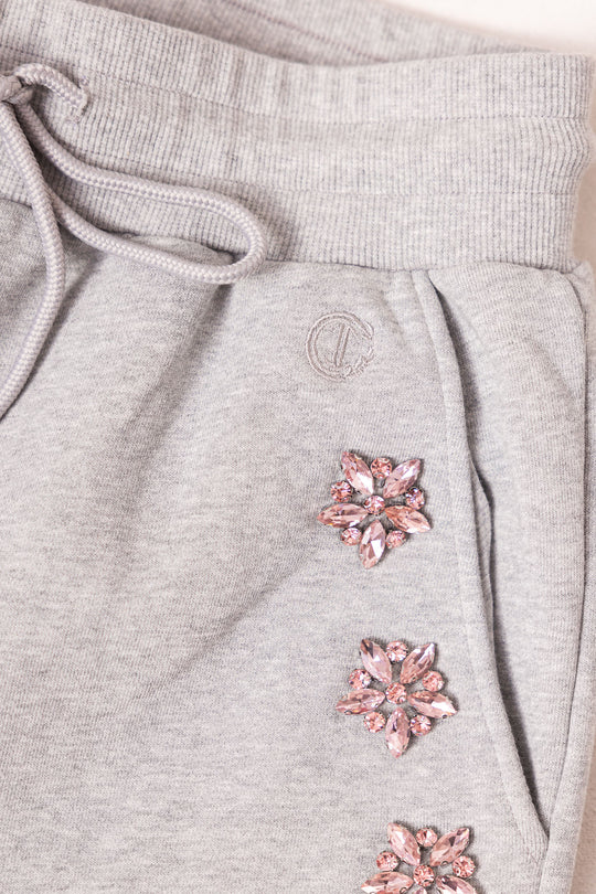 grey sweatpants against a white background