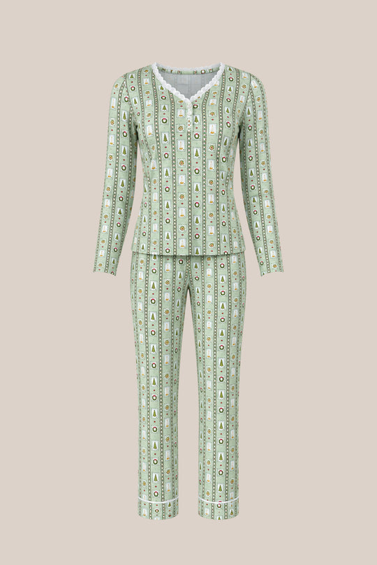 The So Soft Henley Pajama Set in Merry Mail Linear by Ivy City Co features green and white stripes, long sleeves, pants, and maternity-friendly comfort with tree and geometric prints on a beige background.
