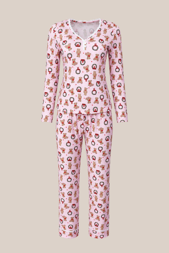 The So Soft Henley Pajama Set in Teddy Bear Wreaths by Ivy City Co features pink long sleeves, a lace-trimmed neckline, and cute cupcake and bear prints—maternity friendly and perfect for cozy nights.