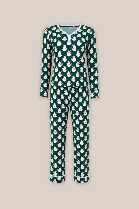 So Soft Henley Pajama Set in Very Merry Santa by Ivy City Co: green long-sleeve holiday PJs with a white snowman print, lace-trimmed collar, and matching pants in soft cotton-modal fabric.