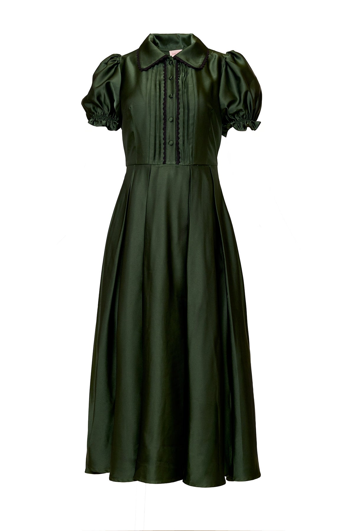 Green dress with puff sleeves on a white background