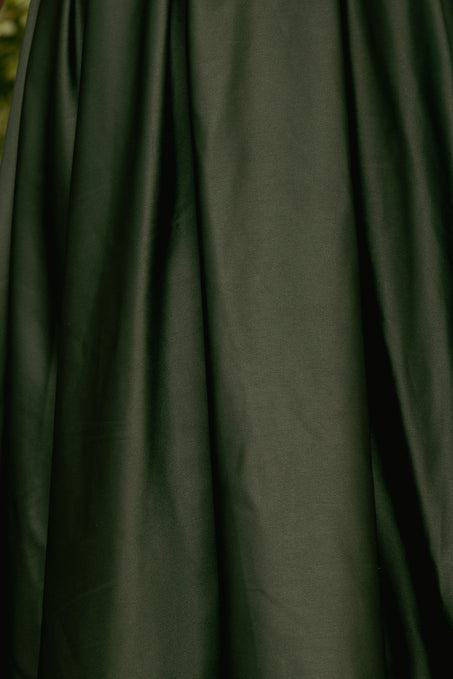 Dark green fabric with folds